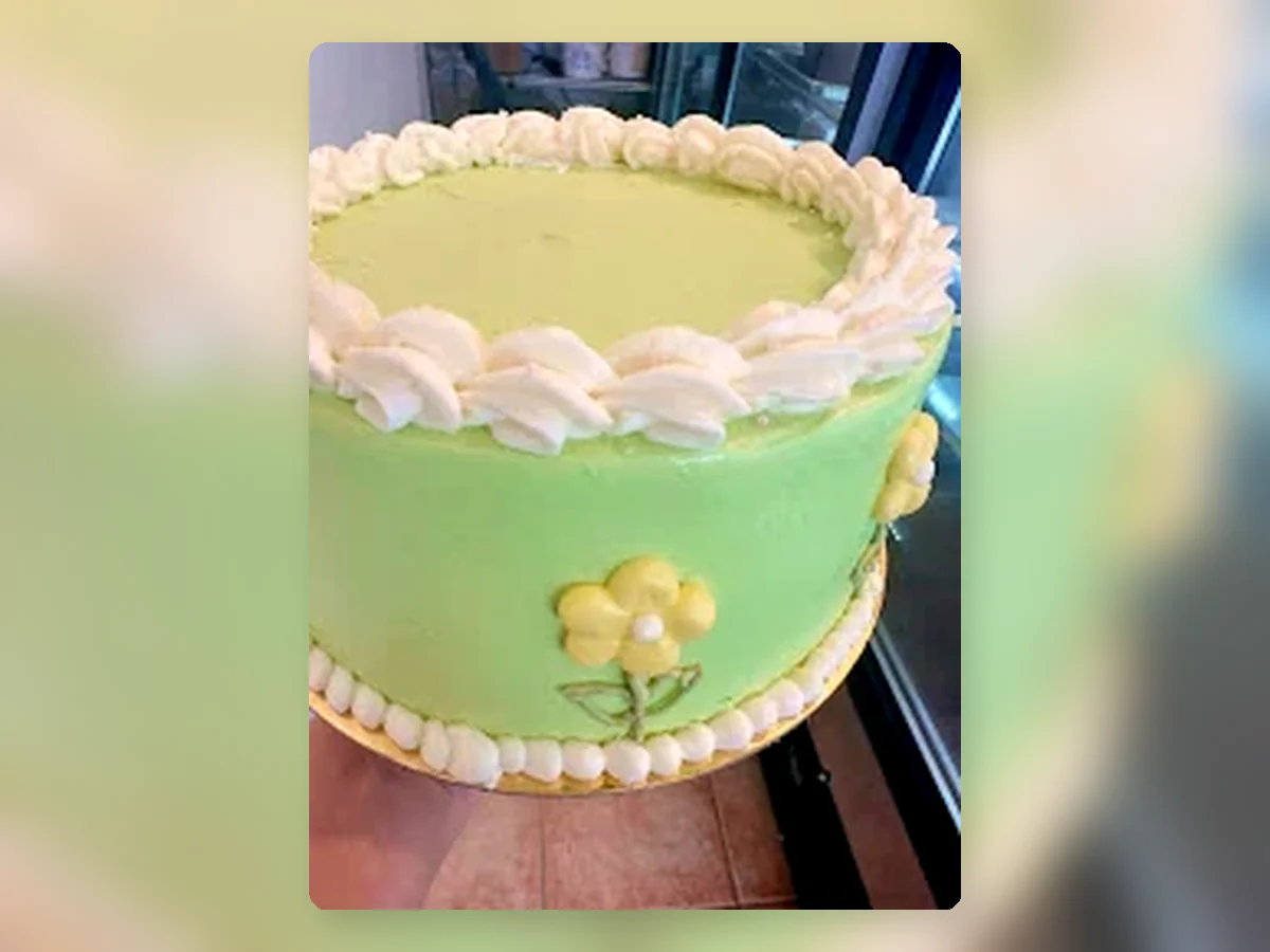 Green classic buttercream cake by Richlea Bakery