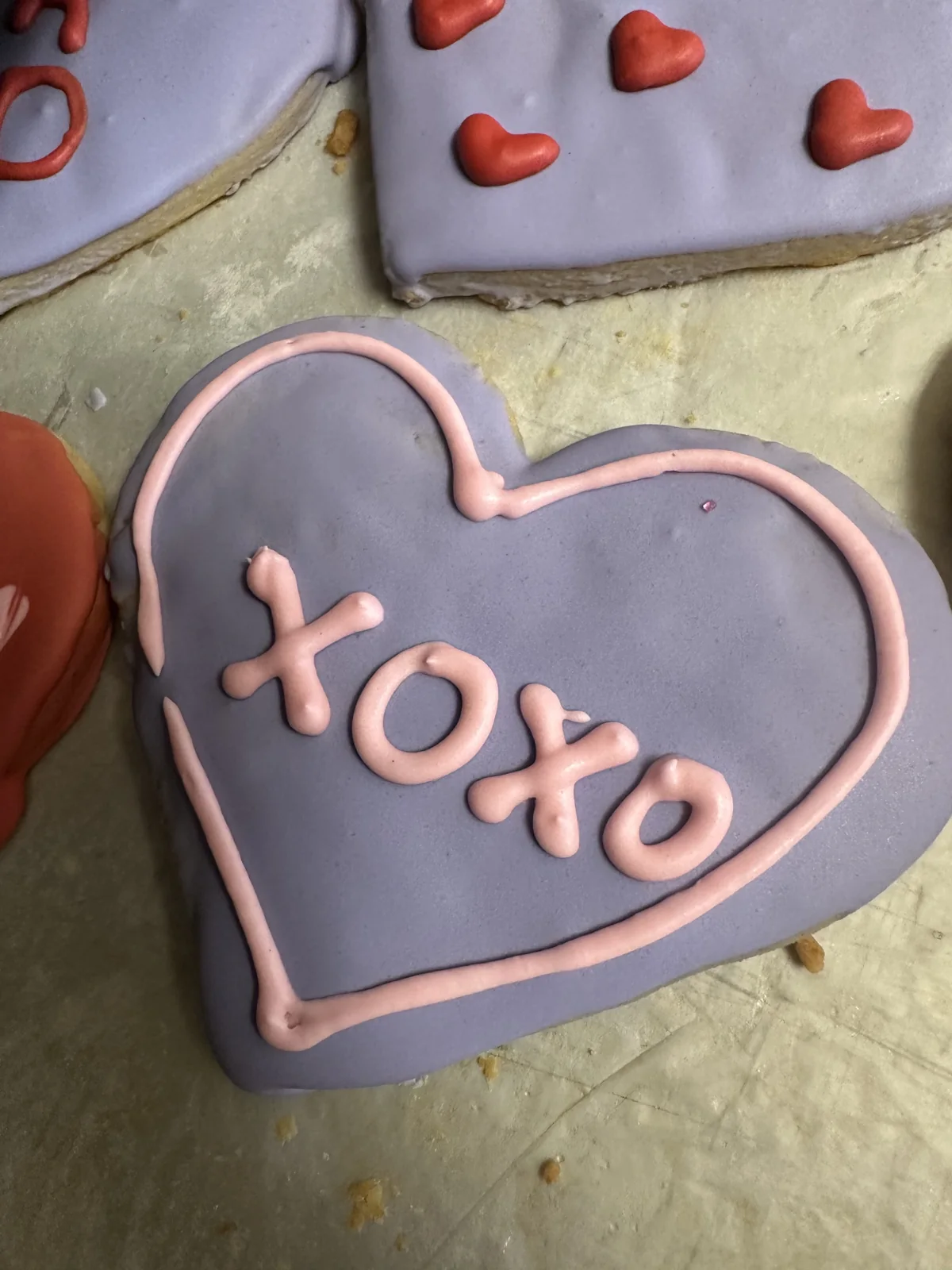 Hand-decorated XOXO heart cookie