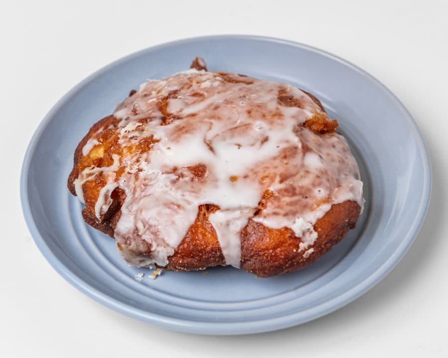 Hand-torn apple fritter with glaze