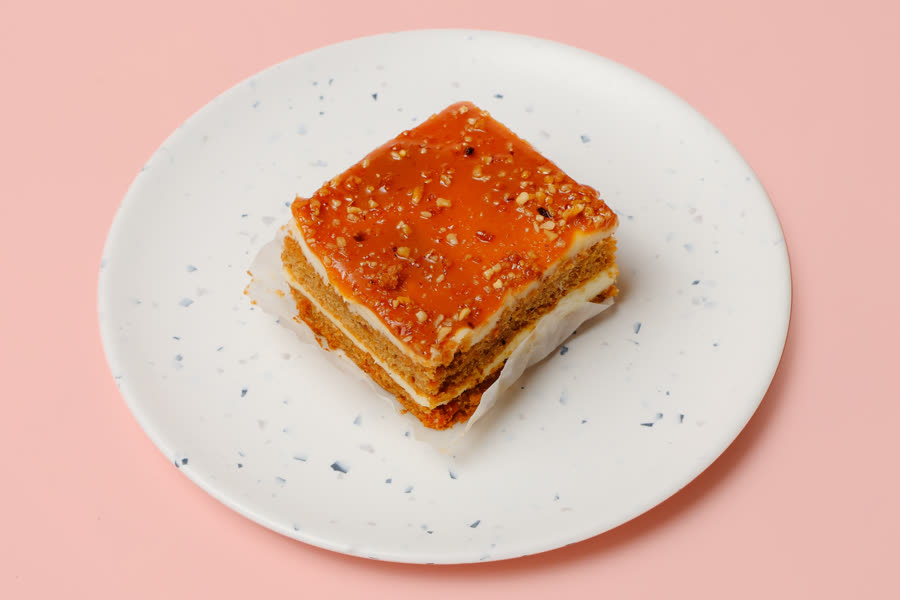 Caramel carrot square with cream cheese and nuts