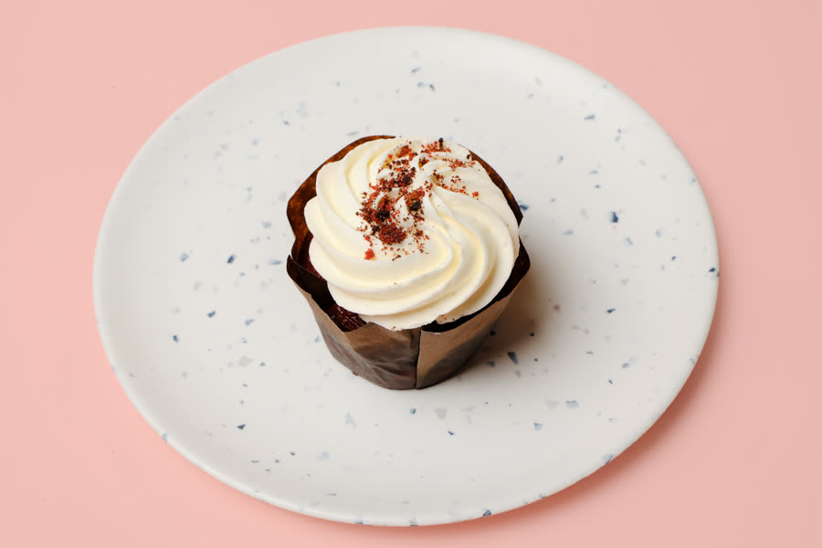 Red velvet cupcake with cream cheese swirl