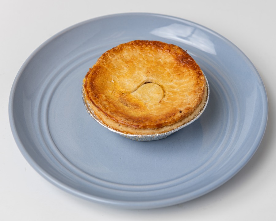 Steak and onion pie with golden crust